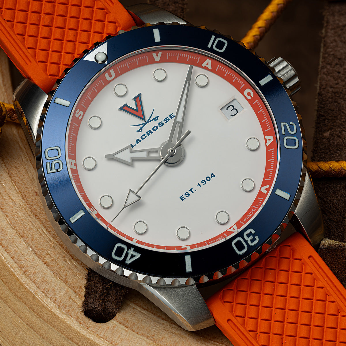 UVA Lacrosse Odysseus swiss made automatic watch. Front view on leather lacrosse with rubber strap.