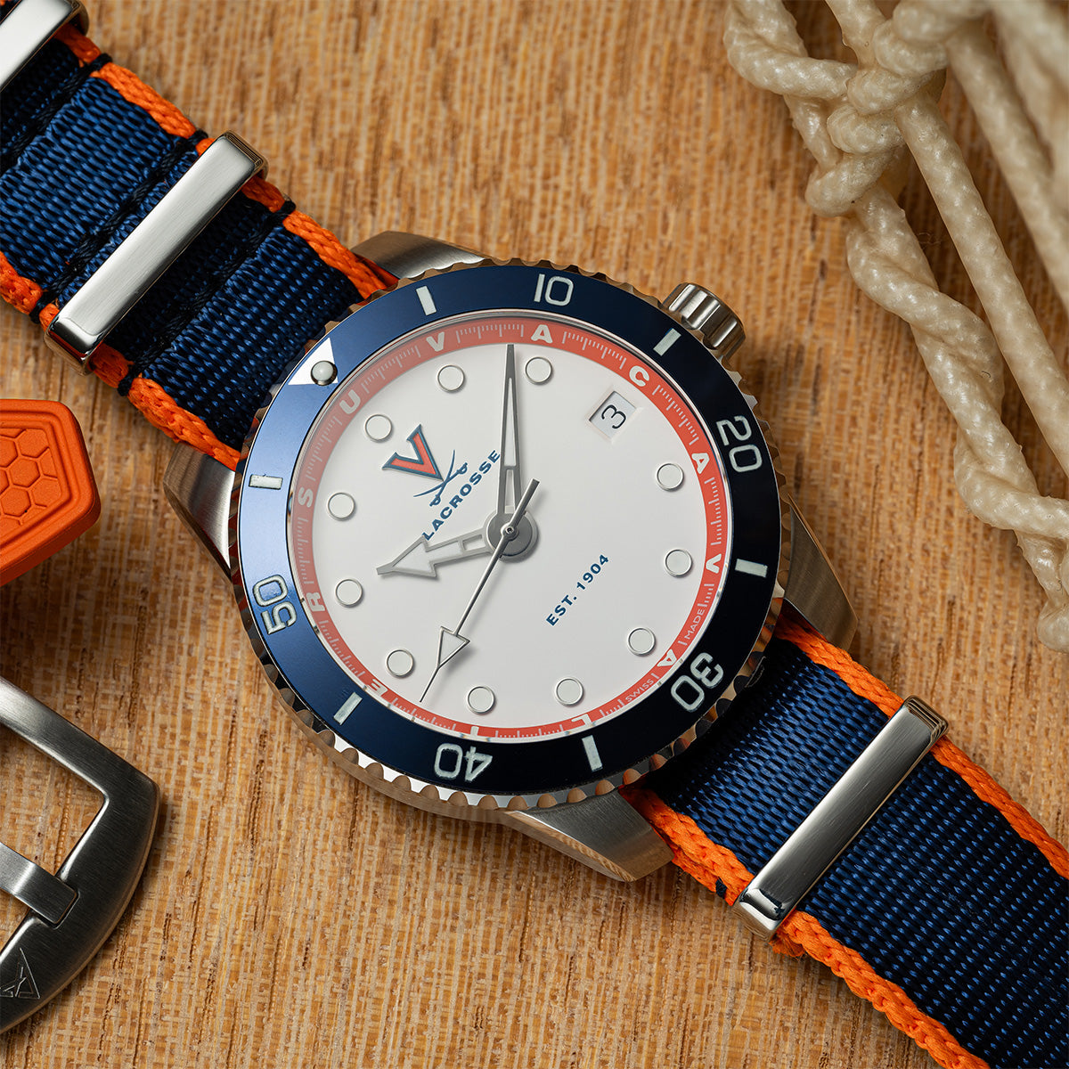 UVA Lacrosse Odysseus swiss made automatic watch. Table view with NATO strap.