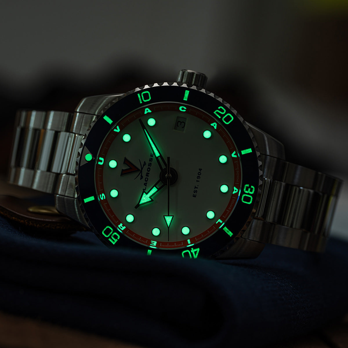 UVA Lacrosse Odysseus swiss made automatic watch. lume view (glow in the dark)