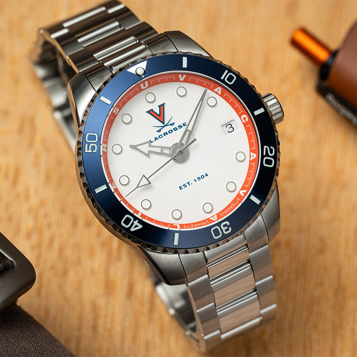 UVA Lacrosse Odysseus swiss made automatic watch. Front view with stainless steel bracelet.