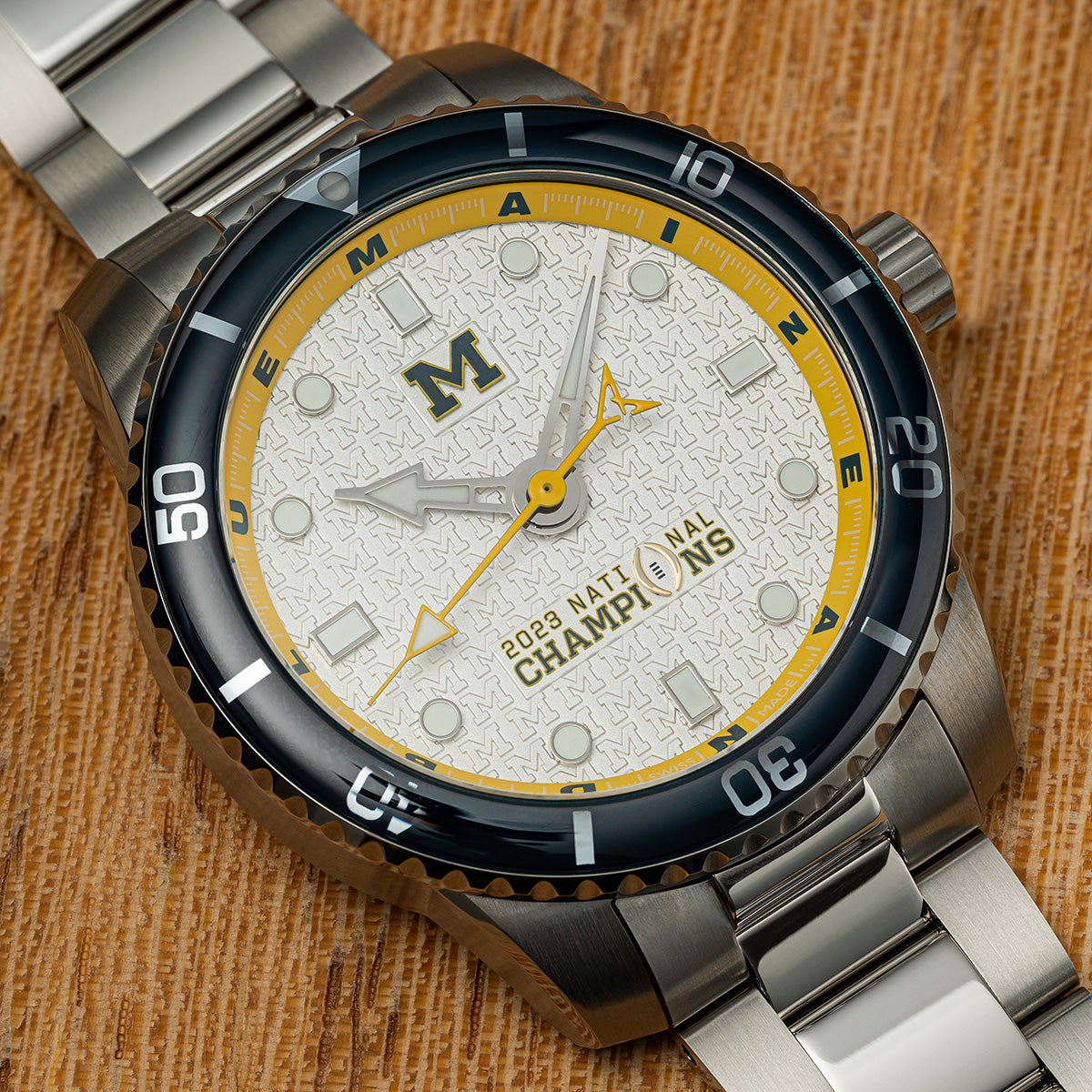 Michigan 2023 National Champions Odysseus CFP 2024 swiss made automatic watch. Stainless steel bracelet. Dial zoom view.