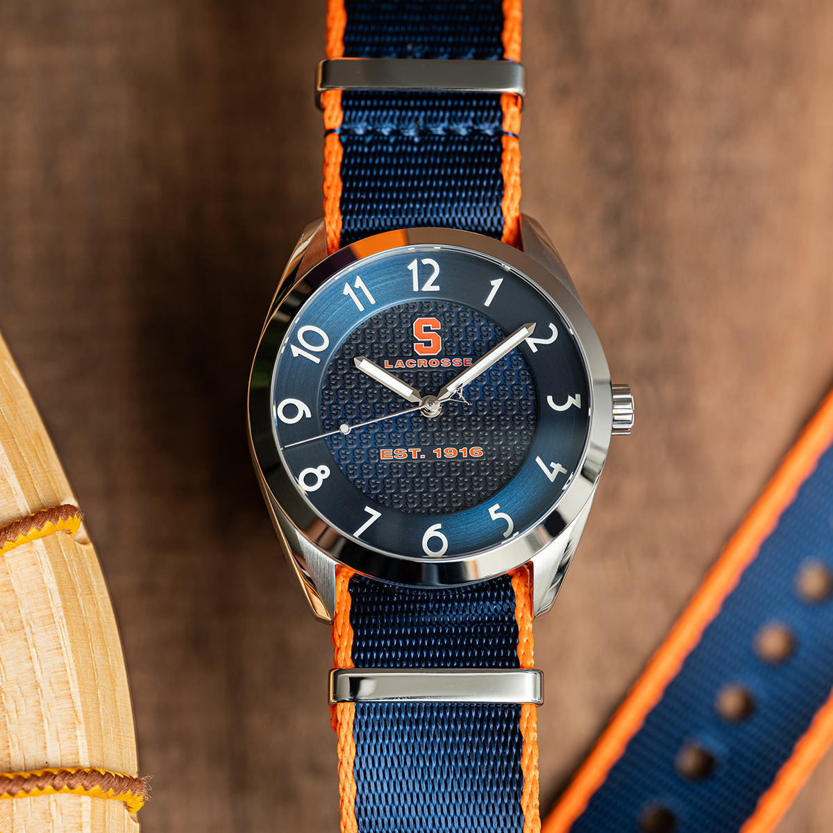 Syracuse lacrosse Swiss made automatic watch. Front view with color-matched NATO strap.