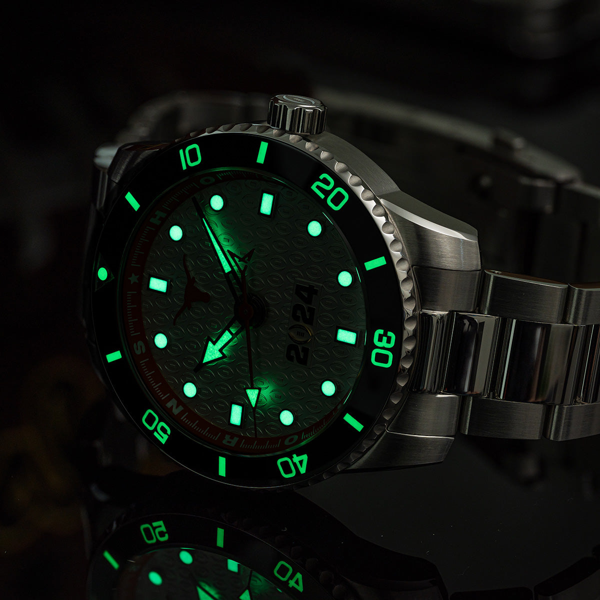 CFP 2024 Texas Longhorns Odysseus swiss made automatic watch. Lume shot (glow in the dark) on a mirror.