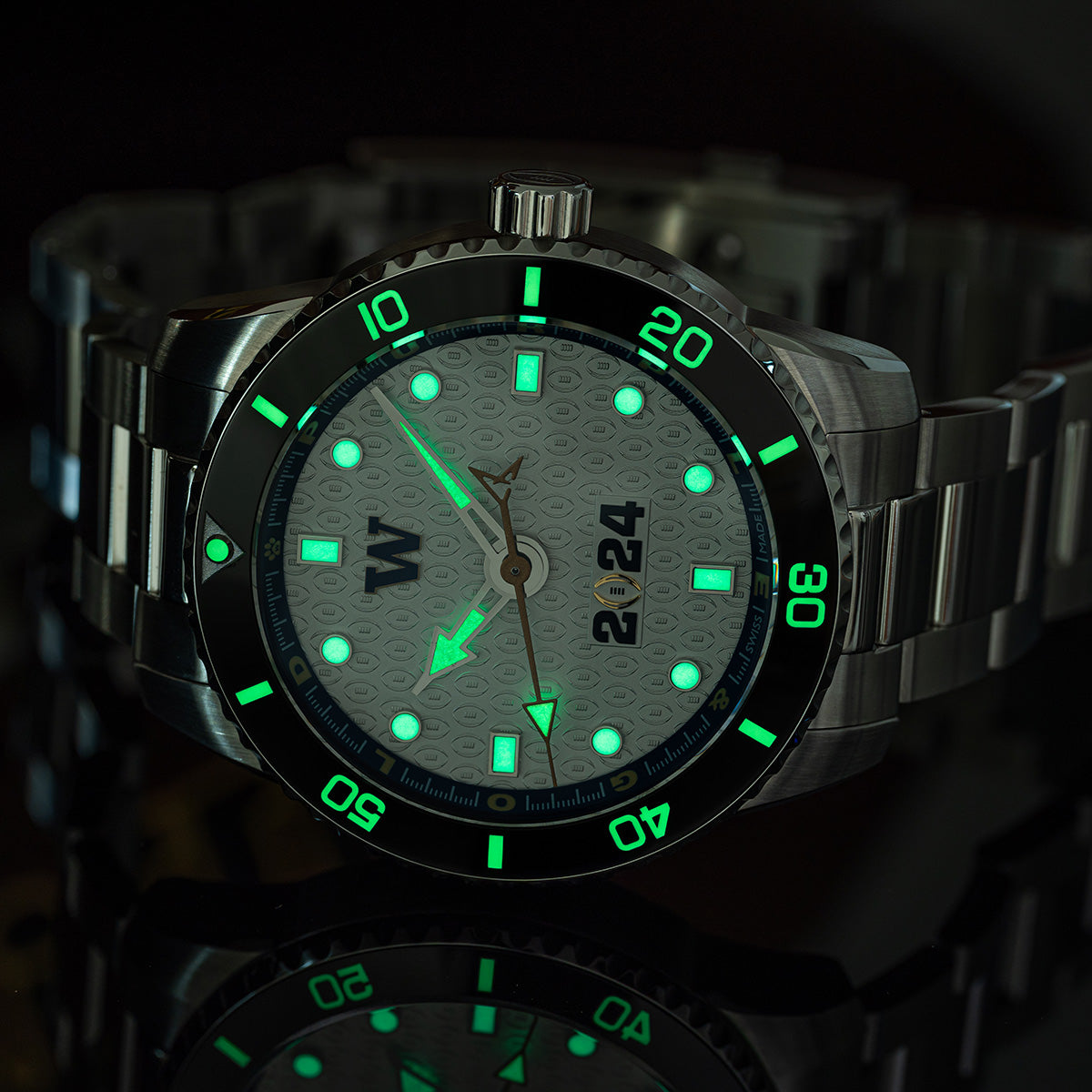 CFP 2024 Washington Huskies Odysseus swiss made automatic watch. Lume shot (glow in the dark) on a mirror.